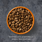 Bowl of pet food with a dark background