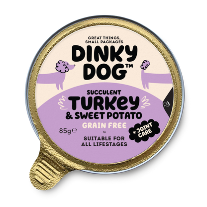 Dinky Dog Turkey & Sweet Potato 85g wet dog food in a gold-lidded container, labeled grain-free and suitable for all life stages with joint care.